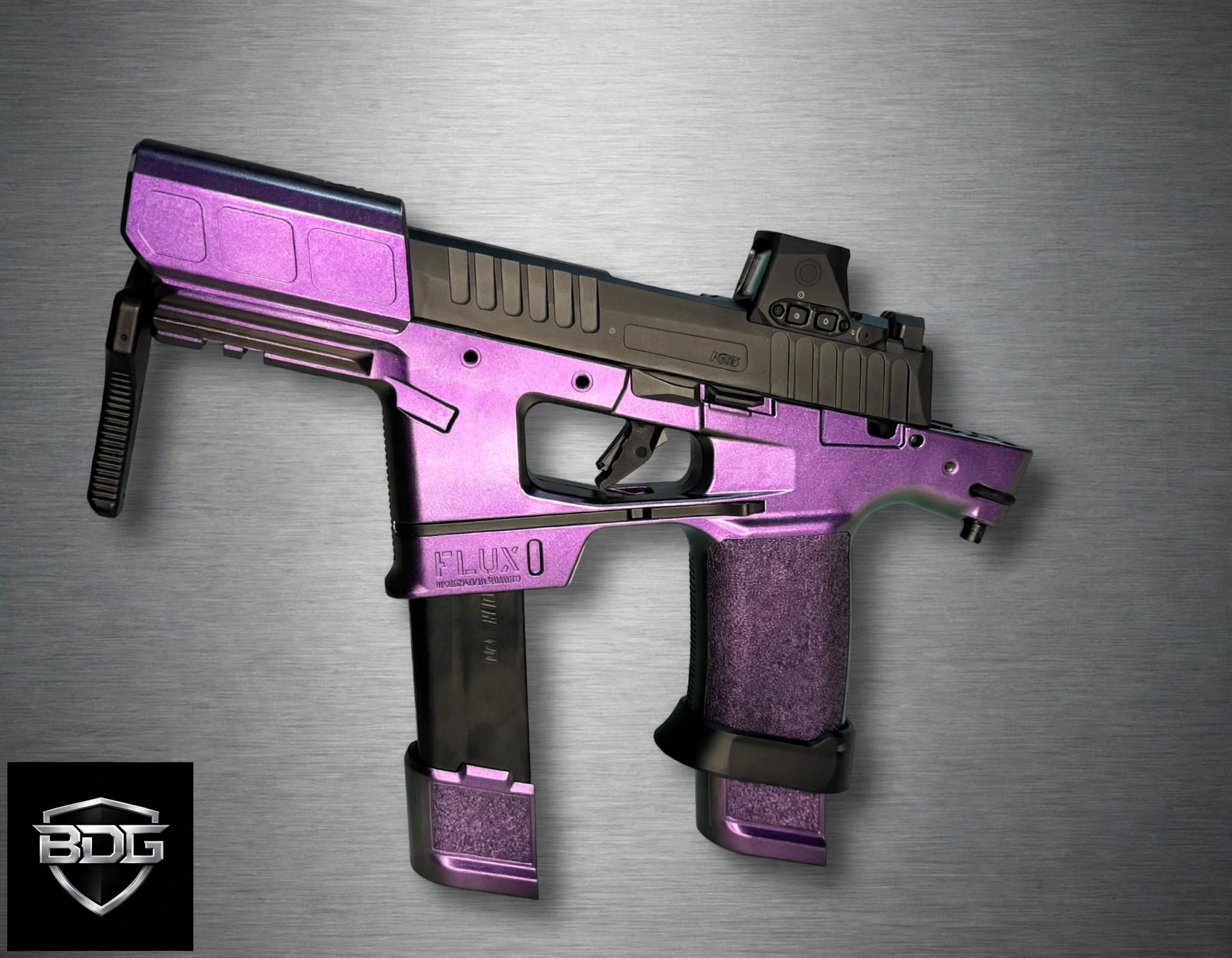 One-of-one SIG P365 FUSE 9mm in a Flux Defense Raider chassis finished in Cerakote FX Mardi Gras, with SIG ROMEO-X red dot and color-matched 21-round magazine end caps — available for purchase direct from BDG